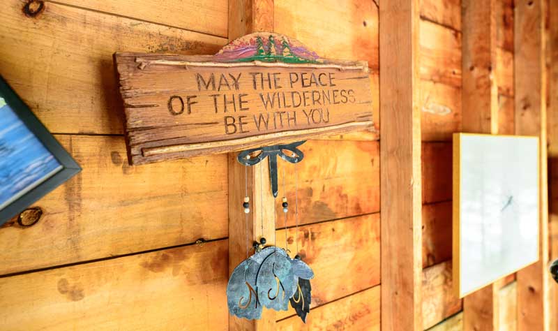 "may the peace of the wilderness be with you" sign